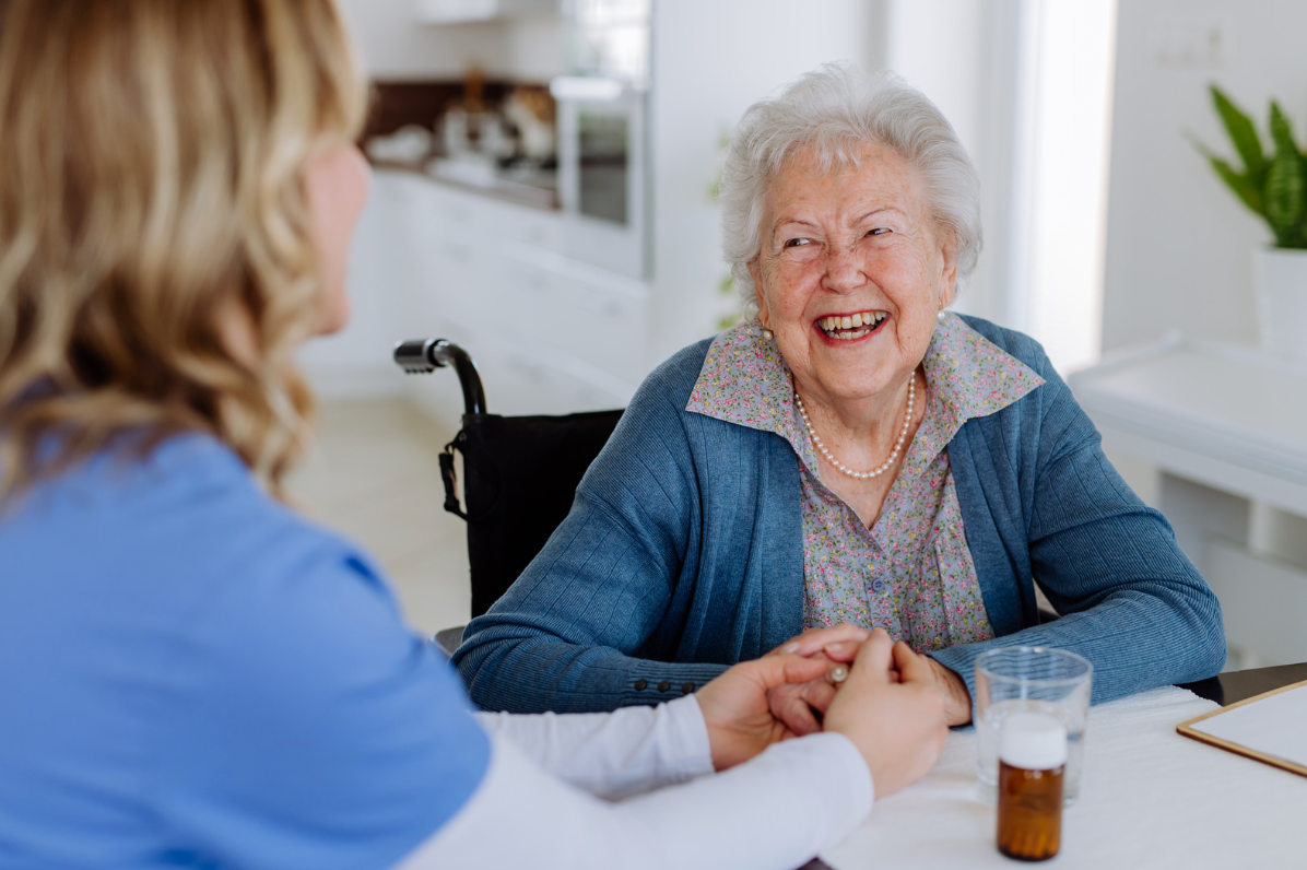 Elderly woman laughing